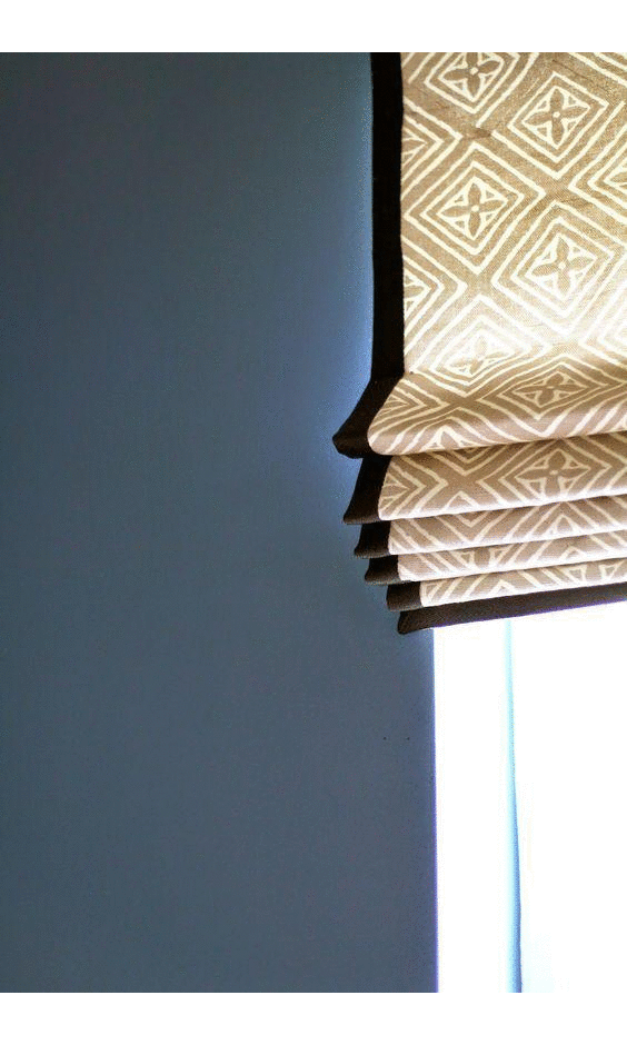 White roman blinds with ribbon trimming